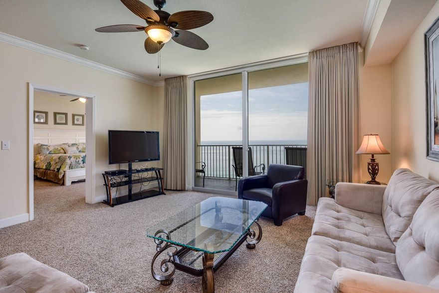 UPGRADED 3 bedroom condo at Tidewater! This is a spacious 3 BR condo with 1865 SF. This unit has an upgraded kitchen and bathrooms with wood cabinets and thick granite. The owners just replaced the flooring with brand new carpet so it's in pristine condition. The large living room and beach front master bedroom both open up to the balcony. The master bathroom features a separate shower and bathtub, a huge walk in closet and double vanities. Tidewater 2202 features plenty of interior storage but in case that's not enough, it also comes with the large linen closets (as seen in the photo section) located in the stairwell right outside of the unit. This condo has it all and will not last long. Tidewater offers the best array of amenities on Panama City Beach such as gulf front gym with great