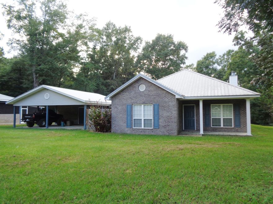 13.94 acre farm located at the HIGHEST point in the State of Florida - Britton Hill - with an elevation of 345 ft!! Pastures are fenced and 3 stall stable makes it a perfect place for horses. Additional 36x32 metal barn with tool rm, 25x24 covered equipment area and 24x32 screened area for cookouts and ''man cave''. Also included is a 13x28 workshop with 13x28 covered area. On the SW side of property is a shooting house near a wet weather pond. Lots of wildlife - deer, turkey, duck, etc. Approximately 20 pecan trees. The brick home features a wood burning fireplace, granite countertops, breakfast bar, ceramic tile floors except bedrooms which are carpet, split bedrooms, metal roof plus porch off kitchen overlooking the pastures. 28x20 carport with laundry area and 1/2 bath. It's all here