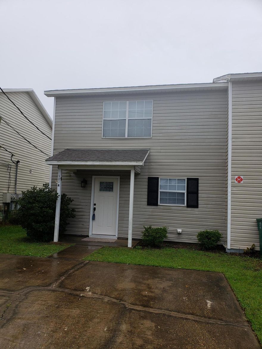 Move in ready town-home just 1.5 miles west of Hurlburt Field just across from Florosa Elementary School. Spacious downstairs living area with sliding glass doors leading to the back-yard patio. Large kitchen sports plenty of cabinets and counter-top space, eat in breakfast nook and bar. To top off the kitchen the owners have installed all new Frigidaire stainless steel appliances. Both bedrooms are located upstairs, and each includes a walk-in closet. The master bedroom has a private entrance to the shared upstairs bathroom. Large fenced in back yard. On a practical note: HVAC installed in 2014; New Carpet installed in 2018; New appliances installed in 2018; New light fixtures/fan throughout in 2018; New front door in 2018; Privacy fence installed in 2018