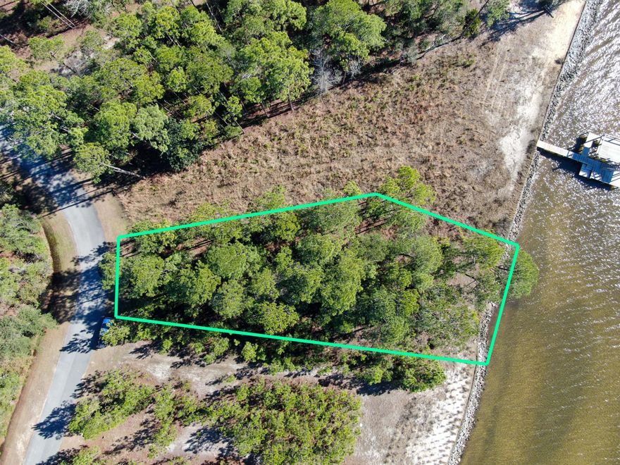 Welcome to Lot 45, a prime bay front piece of real estate offering approximately 0.37 acres of endless possibilities to manifest your dream home. Imagine waking up to a breathtaking bay front view right from the comfort of your own home. This property offers a unique opportunity to build your dream home showcasing the beauty of the bay. Cherish spectacular sunsets all year long, creating memories that will last a lifetime. Located just a short drive from the amazing Emerald Coast beaches, you can effortlessly enjoy the sandy shores and crystal-clear waters whenever the mood strikes. Embrace and create the life you've always wanted in this exceptional Bay Front community. Don't miss the chance to make this picturesque property the canvas for your dream home.
