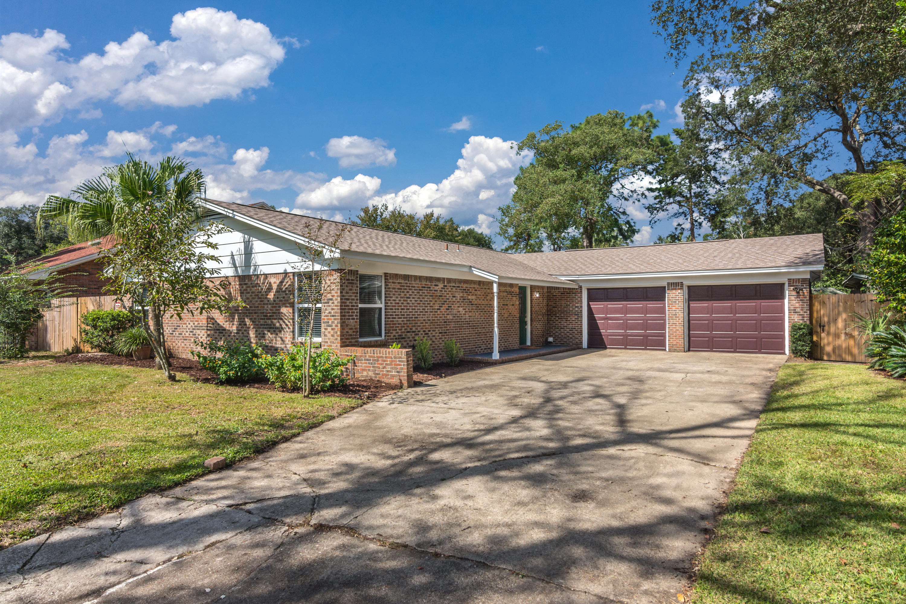 Great brick home in the sought after Kenwood neighborhood. This 3/2 home has been renovated and all the major systems have been replaced in recent years. There are two spacious living spaces, one which has a nice brick large fireplace and the other which has a wall of shelving and cabinets. There is also a dining room and breakfast room off the kitchen. The long laundry room features lots of storage and a brand new water heater(2020). The new dimensional shingle roof(2020) comes with a 10 year warranty and a newer AC (2017) is also included. This home also features copper wiring, new bathroom showers/baths and is also freshly painted on the outside and some inside too. The