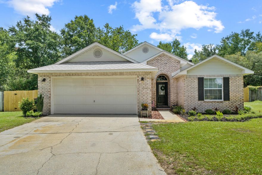 Welcome to your dream home! This beautifully updated 3 bedroom, 2 bathroom home boasts tall ceilings and a large kitchen designed for both functionality and style. With ample counter space and an abundance of cabinets, meal prep and storage will be a breeze. Step into the living area with new flooring and baseboards that add a fresh and modern touch to the space. Enjoy peace of mind with a roof and HVAC system that are only 5 years old, ensuring efficiency and reliability for years to come. Termite bond installed in 2019 and the home has had monthly pest control since 2019. The large fenced backyard is perfect for entertaining, featuring a cozy fire pit where you can gather with family and friends. Whether you're hosting a summer barbecue or a quiet evening under the stars, this backyard is a versatile space that caters to all your needs.