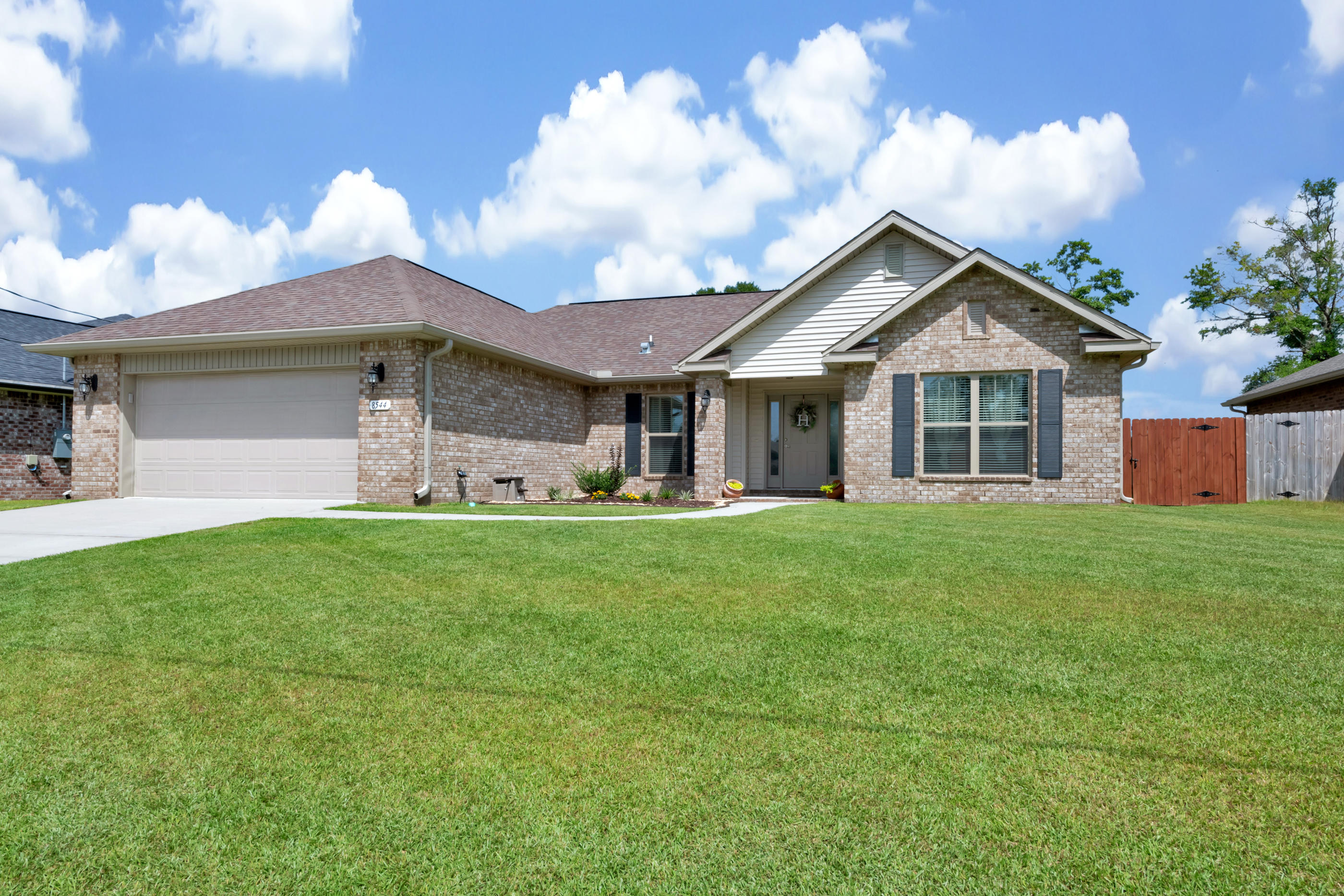 This 3/2/2 Plan is Immaculate. The large open concept is perfect for entertainment and dining. The spacious Master Bedroom is built for a King Size Bedroom set and plenty of room to spare. The Master Bathroom has a separate shower and Garden tub that has been recently updated with shiplap wall accents to give this home a warm and cozy feel. Beautiful marble vanities and his/hers walk in closets. Family Room, Kitchen have 10ft ceilings and double pane windows offering natural light. Armstrong Cabinets with Granite Kitchen counter tops and island. Luxury Wood Vinyl Plank in wet areas. 2x6 exterior walls and R-38/R-19 insulation provide energy efficiency and low utility bills. Lanai w/ ceiling fan over looks the back yard to relax and entertain along with backyard shed for outdoor storage