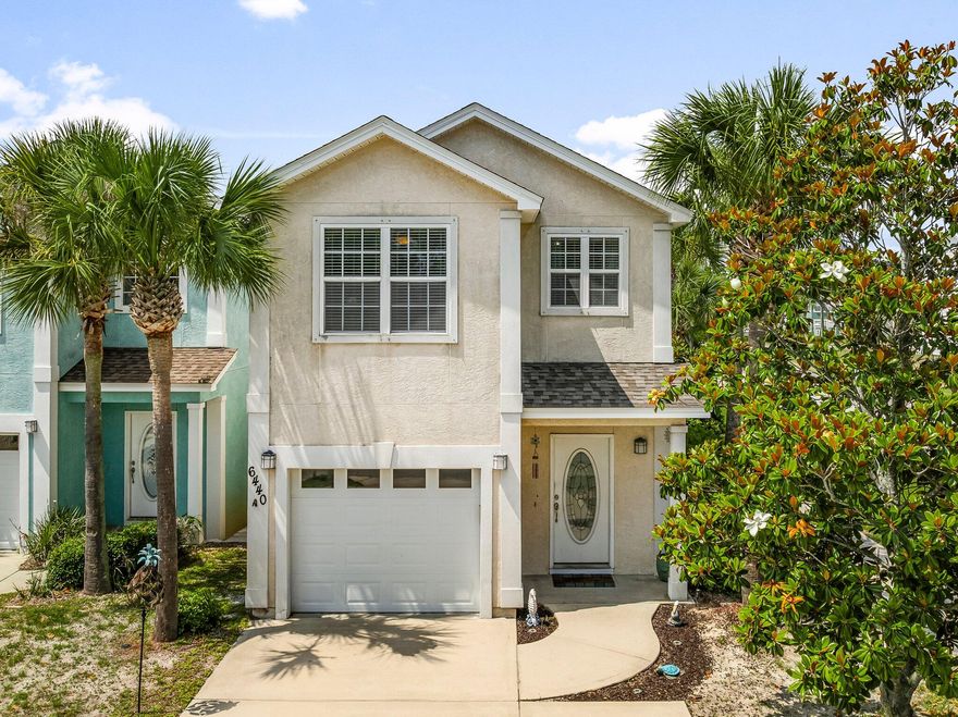 Coastal Charm Meets Modern Comfort - 6440 Summer Oak Drive Welcome to your dream beachside retreat! This charming two-story home offers the perfect blend of coastal living and modern convenience, ideally situated just minutes from the shoreline. Boasting 3 bedrooms, and 2.5 bathrooms. This home is move-in ready for full-time residents, vacationers, or savvy investors. Step inside to discover an inviting open-concept kitchen and living space, designed with functionality and style in mind. The kitchen features stainless steel appliances, a vibrant tile backsplash, and ample cabinet space--perfect for entertaining or casual family meals. Enjoy your morning coffee at the island or on the back patio. Upstairs, spacious bedrooms offer ample natural light, while the primary suite includes its own balcony for a serene private escape.  But the real showstopper is outside: a fenced backyard oasis complete with a private above-ground pool, large patio area, and multiple umbrellasa true slice of paradise for sunny Florida days. Additional highlights include: Attached 1-car garage Low-maintenance landscaping with tropical palm trees, minutes from the beach, dining, and shopping, Ideal as a personal residence or short-term rental Don't miss the opportunity to own a piece of paradise. Schedule your private tour today and start living the coastal lifestyle you've always imagined!