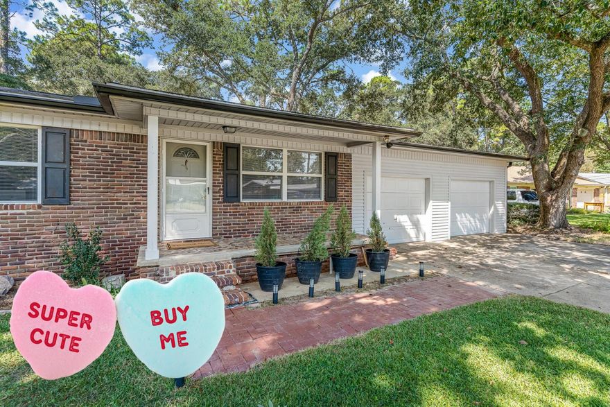 AFFORDABLE and MOVE- IN READY!  Don't miss this home with the character of original wood floors and updates you'll appreciate!  The interior walls, baseboards and doors have just been freshly painted.  The main bathroom was completely renovated (2023) with a glass/tile walk in shower, new floors, fixtures and shiplap wall.  Bonus - plenty of HOT water from the tankless water heater (2018).  The eat-in kitchen leads out to a spacious backyard with full privacy fence.  There's plenty of space for dogs, gardens, a POOL and more!  Take note of these updates - roof 2018, electrical 2018 & 2025 and gutters 2022.  Plus, the washer and gas dryer stay for you!   Work from home?  Live Oak Fiber and AT&T Fiber are available for excellent connectivity.  The oversized garage (26x29) has high ceilings