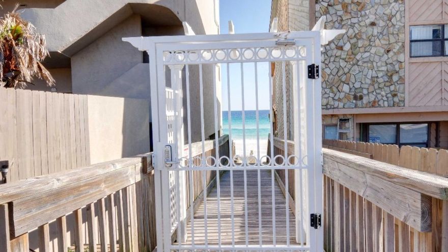 When we say ''steps to the beach'' we mean steps to the beach!!! Not 3 blocks to the beach! 30 second walk to the beach access...you cannot find a property this new, this nicely furnished and this close to the beach for this price!This beautiful townhome was built and furnished in 2014. Four bedrooms with four full baths. Open floor plan with partial gulf views from the second level master suite #2. Two designated parking spaces right outside the front door with plenty of overflow parking. Sleeps fourteen comfortably. Gross rental projects from 55k-61K or 42K NET to owner guarantee. See you at the beach!