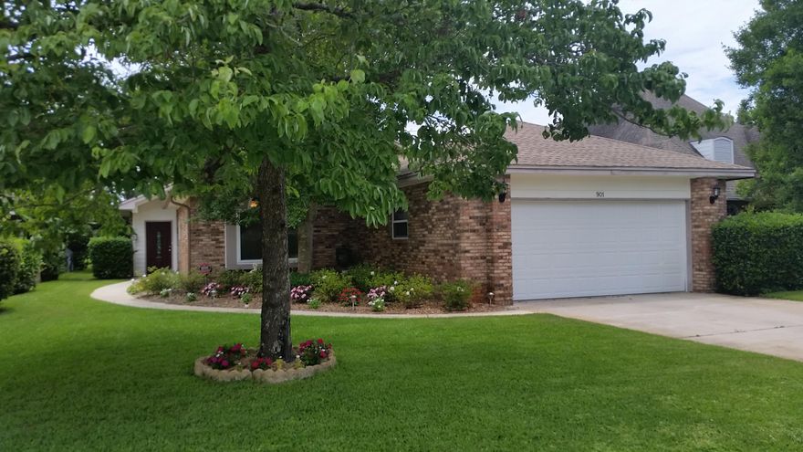 Fantastic location in gated community with golf and tennis. Immaculate and updated home shows beautifully. Sitting on the 9th fairway of Shalimar Pointe Golf Course. This single story, brick home offers great views. Home has pretty window and ceiling treatments throughout. Flooring is wood laminate or tile for easy clean up. You'll love the open kitchen with cathedral ceiling, pendant lighting, stainless appliances and raised breakfast bar. Bright and cheerful dining area overlooks the golf course. Large living room offers nice fireplace, and family room is open to kitchen and screened porch. Spacious master bedroom will accommodate large furniture and has a vaulted ceiling and walk-in closet. Super nice bath with dual undermount sinks, marble counter and custom tiled shower. Seller has made many updates and upgrades to the home since September of 2014 to include:  hurricane impact windows,  laminate wood flooring, kitchen appliances, custom blinds, front door, hot water heater, master shower, marble vanity, toilet, hall bath tub, toilet, granite vanity, plumbing and lighting in both baths and kitchen, fans, security system, interior paint to include ceilings, door knobs and hardware, lawn sprinkler system, garage door opener and landscaping.  Association fee of $100/quarter covers road maintenance, common area lawn service and watering systems, street lights, gate house and gate maintenance and storm drain maintenance. This home is move in ready!