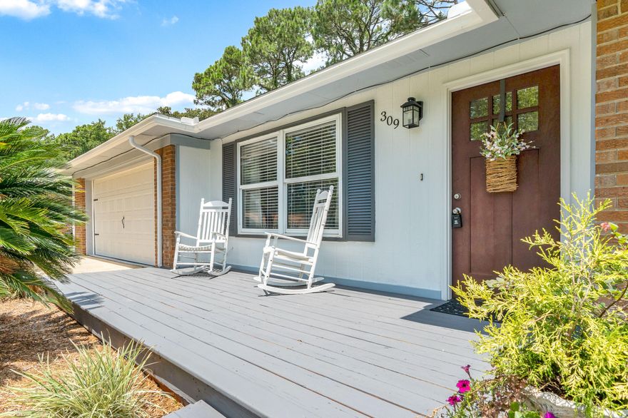 Recently renovated kitchen with new cabinets, tile backsplash, stainless steel appliances, and granite counters. Laminate wood flooring throughout with tile in the wet areas. Master bath was renovated prior to the owners moving in and has tile and glass surround shower and new vanity and sink. Large laundry room and double garage round out the basics for this lovely home. Centrally located in the heart of Niceville and within walking distance to the High School. The Choctawhatchee Bay is approx a half a mile away for all you water enthusiast. The roof and water heater were installed in 2016. Owner states no aluminum wiring present. This home is truly move in ready.