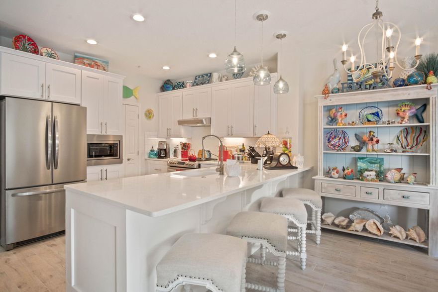 This astonishing and creatively designed property recently had a $165,000 remodel. This spacious and stunning 3-story town home has modern amenities and architectural character in a fantastic location directly across from your gated, deeded beach access. From the moment you step foot onto the luxury porcelain tile you'll notice the home boasts new stainless steel appliances, shaker cabinets, gorgeous granite counter-tops, pantry, multiple ship-lap walls, hand carved wood stairs, 2 new HVACs, two master-bed walk in closets, plus so much more. Heart-stopping gulf views from 2 private, deluxe size balconies. Qualified buyers can purchase for 10% down. Perfect for a successful vacation rental, full-time home or 2nd home. Low monthly HOA fee of only $215 per/mo! $64,000 rental projections!