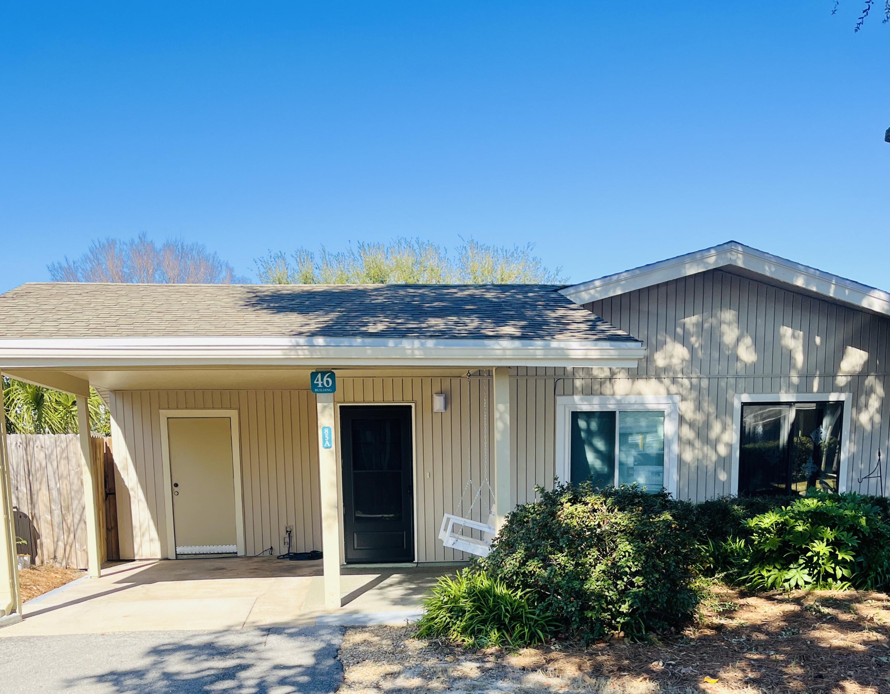 The Tennis Villas in Seascape Resort are the only condos in the resort that offer a carport and large fenced in back courtyard.  This is the only 2 bedroom 2 bath condo on the market. Condo has been renovated with new paint, LPV flooring thruout, both bathrooms, kitchen, new interior doors. See virtual staging for potential.  COA is $1506.37 quarterly and master HOA is $925.32 quarterly covers building insurance, basic cable. internet, water, trash. Tennis courts, pickle ball courts, basketball court, pool, and golf course are around the corner. Beach is a short walk or quick golf cart ride. This is a family owned property and has never been a short term rental.