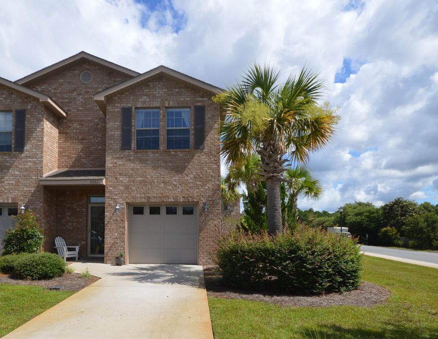 END UNIT IN PRIME LOCATION! ACROSS FROM THE POOL AND PLAYGROUND! This Unit was originally the Model Unit and has many upgrades, including wood plank floors, fenced-in backyard for pets and privacy, and stainless steel appliances. This gorgeous 3 bedroom, 2.5 bath Unit with single car garage is better than new and move-in ready. Tile flooring in all wet areas, and beautiful recessed panel maple cabinets overlook the dining and family room. Additional features include: 5 -1/4 Base Molding, security system, storm protection, Storm door, and laundry room upstairs near Master Bedroom. This property located just minutes from some of the World's most Beautiful Beaches! Cost of HOA covers most of your insurance​. ​ Don't miss out on this​ end unit. Call to schedule a showing.
