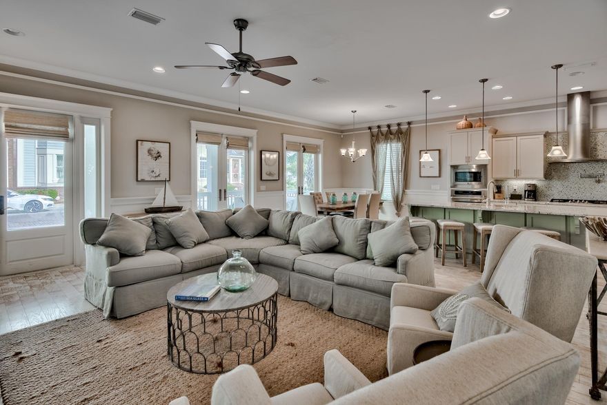 The highly desirable ''Capri Plan'' located south of 30A in Prominence. This stunning beach cottage is professional designed and offered fully furnished. This home is just steps from the new resort style pool being built in Prominence South. In addition, there will be direct beach access through Watersound beach club, which is available for membership purchase. This one of a kind property features (3) bedrooms, (1) large bunk room, (3.5) bathrooms, and a (2) car garage. Large bunk room can be converted into a 4th bedroom. The original model home for the neighborhood and arguably one of the nicest single family homes in prominence with virtually every upgrade imaginable! Enjoy the luxury of buying a turn-key home with strong rental potential of $70,000 per year and HOA only $150 per month! This breathtaking floor plan offers an open concept with incredible craftsmanship from the moment you enter the home. A sophisticated coastal style that defines indoor and outdoor spaces that seamlessly blend into one harmony. Upgrades throughout the home include coastal wood flooring, shaker style pocket doors, extra wood trim, finished mud room in the homes rear entry, updated tile throughout, central vacuum, integrated pot filler in kitchen, upgraded granite counter tops, floating bathroom vanities, custom wine rack on kitchen island, rain maker shower heads, epoxy coated garage floor in the two car rear entry garage. In addition, the exterior of this home has been repainted with high mildew and mold resistant paint within the last year and both HVAC systems have been replaced with completely new systems inside and out within the last year!! This home has been meticulously cared for and shows like new, only better. 

There is a spacious master suite located on the 1st floor. The master bathroom features a frameless walk-in shower, large garden style tub, granite counter-tops, and dual vanity sinks. The expansive kitchen showcases custom cabinetry, stainless steel appliances, granite countertops, and a massive island great for entertainment. Upstairs you are greeted by two additional guest bedrooms and a large bunk room. Both guest bedrooms feature there own private bathrooms. Unwind your day by relaxing on the front porch or walk over to the Hub where you'll find a variety of entertainment from shops, restaurants and more. 

The Town of Prominence is located on HWY 30A between Seagrove and Alys Beach. Residents will enjoy easy access to a beautiful Town Center, Resort style pools, Fitness Center and Private Shuttle Service to the beaches of 30A. ''The Hub'', the community's town center includes restaurants, shops, and an amphitheater with covered event pavilion, a cinema screen for movies as well as a stage for concerts and events.