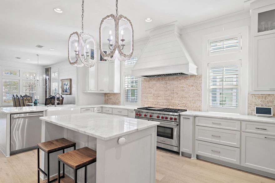 259 Moonlit Way is an exceptional Southern‑inspired residence tucked within The Preserve at Regatta Bay, an exclusive 21‑home enclave known for privacy, elegance and refined coastal living. Built in 2019, this thoughtfully designed home blends timeless architectural character with modern luxury finishes throughout. Step inside to soaring natural light, designer selections and wood flooring that flows seamlessly across the home. The gourmet kitchen is a statement of craftsmanship--featuring quartz countertops, custom cabinetry, a Sub‑Zero refrigerator, Wolf gas range and a spacious walk‑in pantry. A stylish wet bar just off the kitchen adds the perfect touch for entertaining. Click ''more'' to continue... Offering 4 bedrooms and 4.5 baths, each bedroom is generously sized with large walk-in closets, creating a comfortable and private retreat for family and guests. The home's open layout extends effortlessly to the outdoors, where a sparkling pool provides the ultimate place to unwind. The hallmark of this residence is its expansive wrap-around porch, offering abundant space to relax, dine or host gatherings while enjoying the peaceful, boutique setting of Regatta Bay Preserve. The oversized 2.5 car garage provides exceptional storage and functionality. This is a rare opportunity to own a newer construction luxury home in one of Regatta Bay's most sought-after neighborhoods where charm, craftsmanship and coastal elegance come together seamlessly. Built by Legendary Home Builders, utilizing only the finest materials and high end finishes such as: wind and impact resistant windows, wind and impact rated doors, insulated wind and impact rated garage doors, insulation in all interior walls for energy efficiency, sound proofing insulation between floors for sound barrier, stainless steel door hinges, custom wood shelving in all closets, Kohler plumbing throughout, custom solid wood cabinetry throughout with soft close hinges, surround sound, smart home technology customizable for homeowner, led lighting throughout and so much more! Regatta Bay is a quiet, gated, golf & boating community that offers a LIFESTYLE unlike no other! The Regatta Bay Lifestyle is about convenience! You can golf cart to so many fun places in minutes, including the Beach! Within Regatta Bay, there is golf, swimming, tennis, pickle ball, park, playground, Regatta Bay Clubhouse, Legendary Marine & Legendary Yacht Club. Regatta Bay offers a private road that takes residents to the Destin Commons, where you'll find an array of popular men's and women's retail stores, a variety of restaurants, Whole Foods, Bass Pro, Lowes, AMC movie theater and Uncle Buck's Bowling! ALL ACCESSIBLE BY GOLF CART.