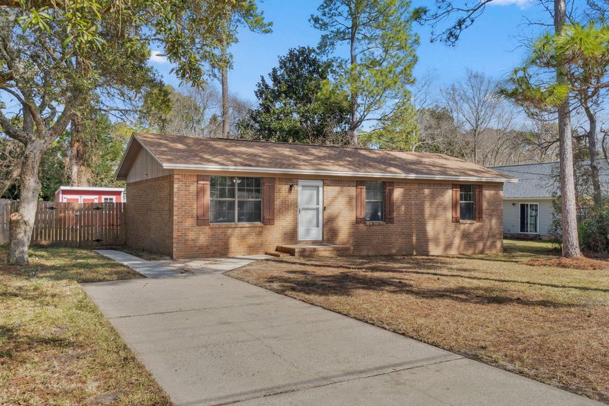 Discover the blend of comfort and convenience at 439 W Pine St. Step into this beautifully refreshed ranch-style home, where natural light streams through a large front window and sliding glass door. With 3 spacious bedrooms, 2 bathrooms, and tile flooring throughout, this freshly painted home offers a move-in-ready experience.The fully fenced backyard is a true highlight, complete with a storage shed and plenty of space to entertain, relax, or play. Hosting family gatherings or weekend barbecues will be a breeze. The expansive front yard and extended driveway provide ample parking.Located just minutes from Hurlburt Field, Fort Walton Beach, and the stunning white sands of Navarre Beach, this home truly delivers on location. Plus, you'll enjoy the added peace of mind of knowing that the Roof and HVAC are from 2021 and the Water Heater 2020. This is the home you have been looking for. VA Assumption 3.375%!
