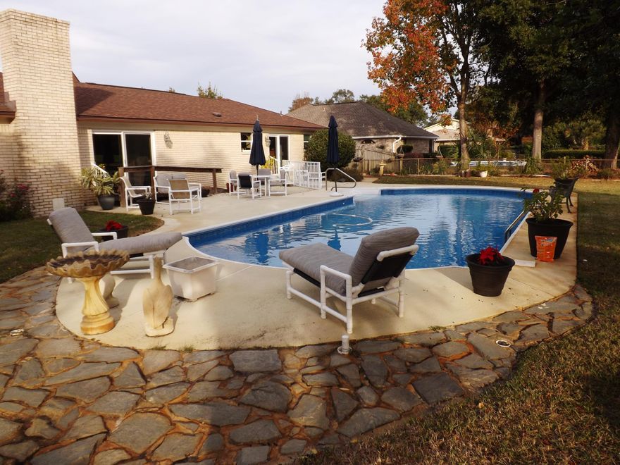 Beautiful, well-maintained home in Lake Lorraine Estates. This 4 bedroom, 2.5 bath home on Shalimar Pointe Golf Course has it all: 2 large living areas, recently updated kitchen with 20'' tile, breakfast room, laundry and hall bath as well as large bedrooms, a fenced back yard plus a beautiful in-ground pool. Dimensional shingled roof and most of the other updates completed in 2012. Pool liner replaced in 2013.