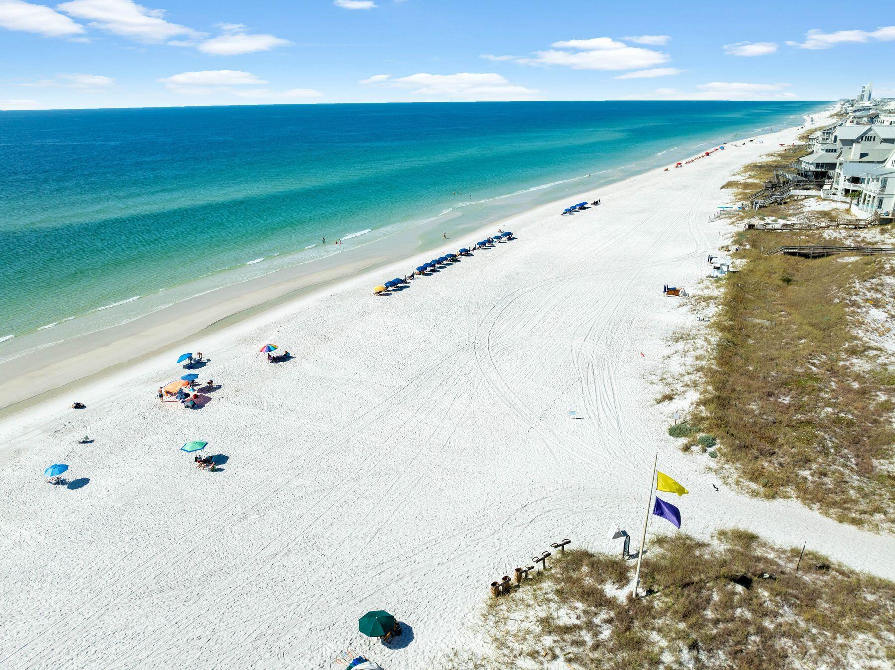 Nestled on the serene South side of 30A, between Watersound Beach and Seagrove Beach, Beachfront II Condos offer an idyllic beachfront escape. Just steps from a quiet beach access, this prime location provides unparalleled convenience and tranquility. Discover an oasis at Beachfront II Condos. Enjoy the beautiful newly built heated pool and hot tub! This condo features a queen bed, pull out sofa bed, breakfast bar, full kitchen, and a separate bathroom, offering modern comfort and convenience. A balcony overlooks the pool area and has gulf views. Beachfront II boasts a range of amenities designed to enhance your coastal lifestyle. Enjoy the spacious outdoor areas, including a large, well-maintained yard, a heated pool, a deck/gazebo area, and a grilling area. For added convenience, the complex features an elevator, covered parking and laundry.