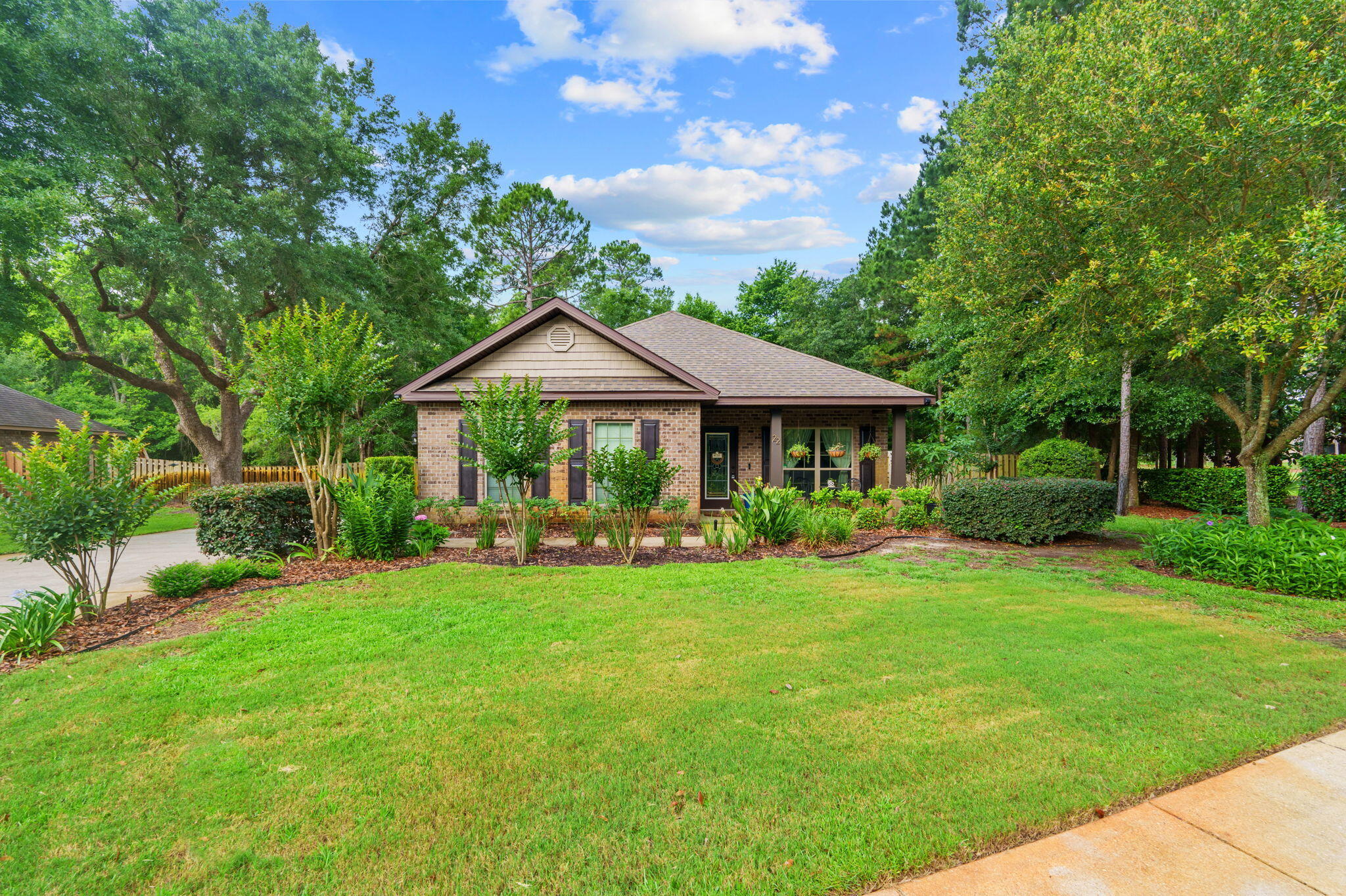 Welcome to 22 Camellia Court-a beautifully maintained 3-bedroom, 2-bathroom home in the highly sought-after Gardens neighborhood of Hammock Bay. Nestled against a serene conservation area with no rear neighbors, this charming residence offers privacy, tranquility, and a true connection to nature.
Step inside to discover an inviting open-concept layout designed for both comfort and functionality. The spacious living area features a cozy gas fireplace, while the modern kitchen boasts stainless steel appliances, a classic white subway tile backsplash, and ample space for culinary creativity. The dining room provides a warm and welcoming setting for gatherings, or it can easily be transitioned into a flexible office space to suit your lifestyle.
The primary suite is a private retreat, complete with tray ceilings, a large walk-in closet, and a spa-like en-suite bath featuring a double vanity and a walk-in shower. Additional highlights include custom cabinetry in the laundry room, with the washer and dryer conveying with the sale.
Step outside to your personal backyard oasis an idyllic space for relaxation and outdoor living. The covered patio overlooks a beautifully landscaped yard with thriving fruit trees, including banana and avocado, a flourishing herb garden, and a charming small pond perfect for unwinding.
As a resident of Hammock Bay, you'll enjoy world-class amenities, including resort-style pools, a state-of-the-art fitness center, scenic walking trails, pickleball and tennis courts, a dog park, and more. Plus, you're just minutes from the new Props Brewery and General Store, as well as the breathtaking beaches of 30A and Destin.
This exceptional home offers the perfect blend of comfort, convenience, and natural beauty. Schedule your showing today before it's gone!
