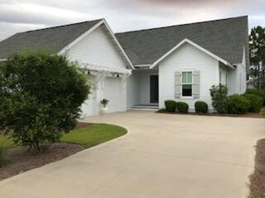 FABULOUS HOME ON PREMIUM LOT! A rare single level 4 bedrooms plus office/bunk room, with 3.5 baths in Winter Garden Section of Wartersound Origins. Home has 2yr old engineered hardwood flooring throughout, 10 foot ceilings, new exterior paint, marble and quartz counter tops, gas range, tankless Rinnai water heater, vented hood, dry bar with custom shelving, fenced in back yard, huge back screened porch. As a bonus this home is located on a premium lot across from large pond and backs up to hiking trails. This home can be purchased completely furnished for a additional price. Watersound offers miles of walking trails, work out facility, golf course, tennis, pickle ball, basketball court, a dock with access to Lake Powell.