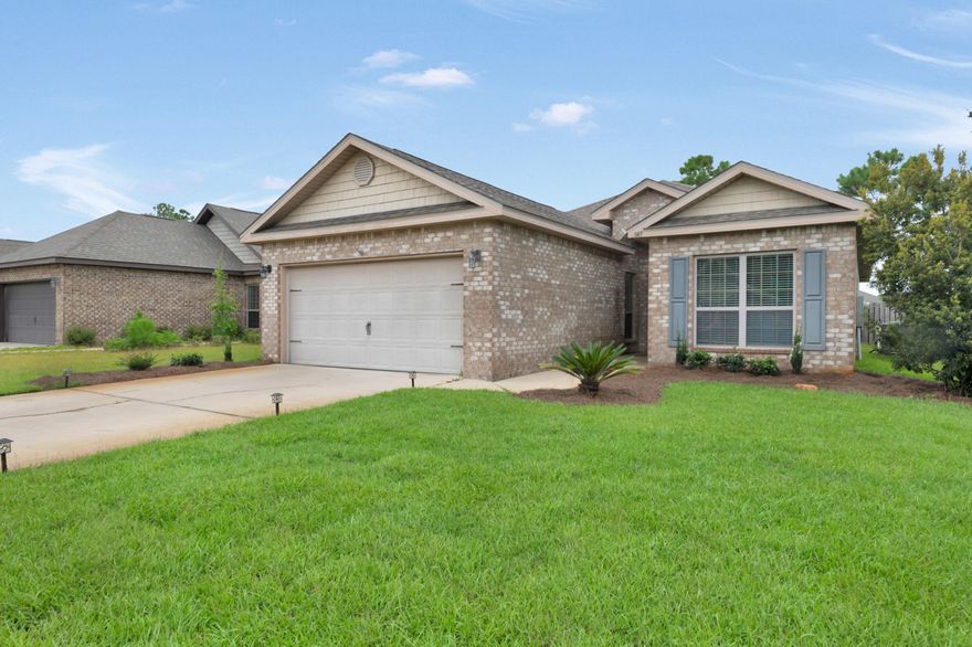 Over 1600 sq. ft. of gorgeous living space in this 4BR 2BA. Don't miss this bright newly built home in the Santa Rosa Beach area. Enjoy this large open layout with beautiful hard flooring in common areas and vaulted and tray ceilings with recessed lighting.So many features to love such as the 2 car garage, stunning master suite bath with dual sinks, separate tub & shower as well as a covered back patio to enjoy views of the lush green backyard.
