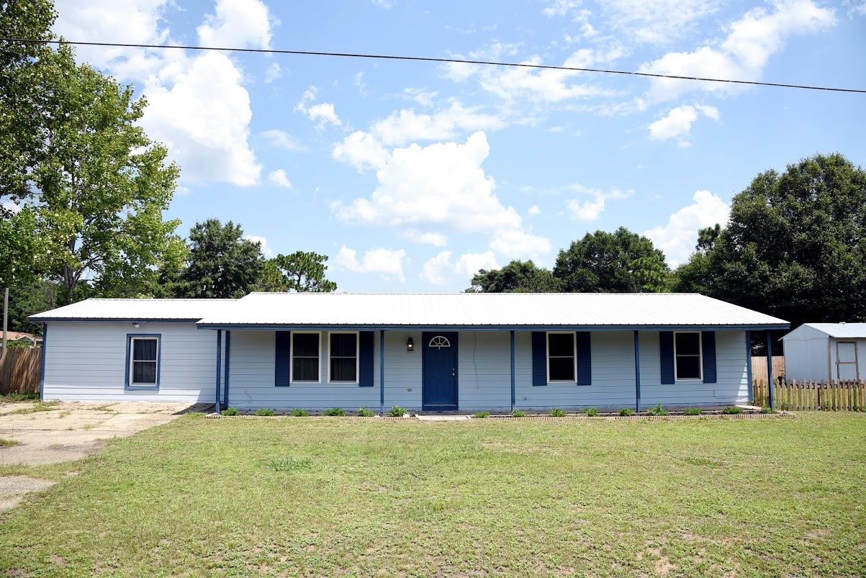CHARMING AFFORDABLE HOME IN CRESTVIEW, FL. This neatly maintained, 4 bedrooms and 2 bathrooms property features a split semi-open floor plan with plenty of closets and storage space. Approximately two years old air conditioner system, newer water heater and metal roof. Remodeled bathrooms, tile throughout, except for the bedrooms. The cozy family area connects to the screened porch that overlooks at the private beautifully sod fenced backyard. And to make this excellent deal even better, Seller is offering a $625 dollars One Year Home Warranty Protection Plan. Convenient location, approximately 5 miles to schools, supermarket, library, shopping plaza and easy commute to military bases and our beautiful white sandy beaches!!!