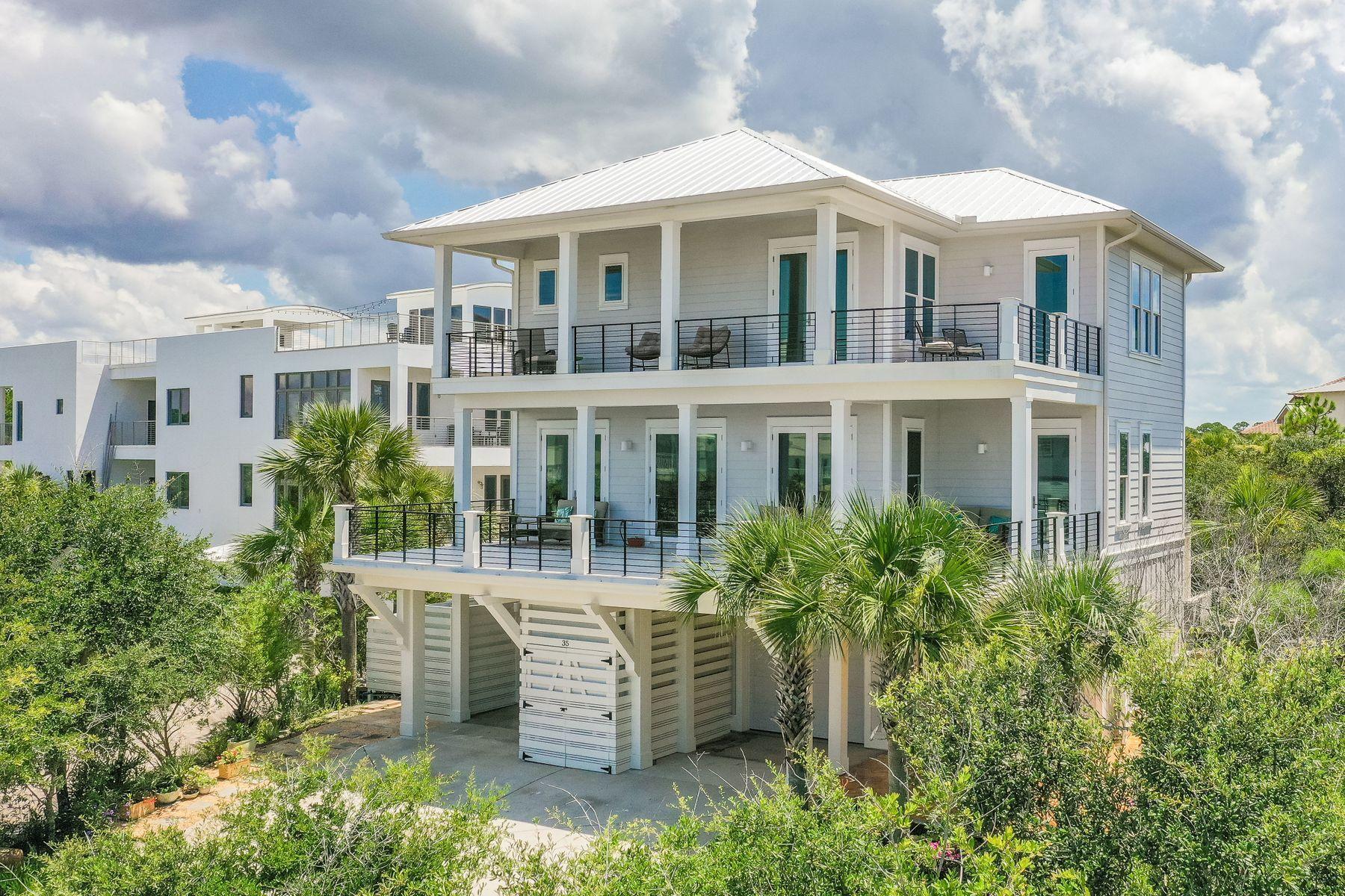 Embrace coastal living like never before with Gulf views as far as the eye can see. Sitting atop one of the largest homesites in Seawinds and only steps from the Gulf of Mexico, this completely renovated three-story home exudes craftsmanship, style, top shelf quality and thoughtful design. Taken down to the studs and refreshed with a contemporary interior & exterior, this whole home remodel incorporated timeless accents and convenience features designed to create the ultimate beach home or full time residence. A total of four bedrooms ensures that space is plentiful with large living areas, multiple hidden reading nooks, and wrap around balconies for panoramic gulf views, which makes the experiences within this home truly magnificent.