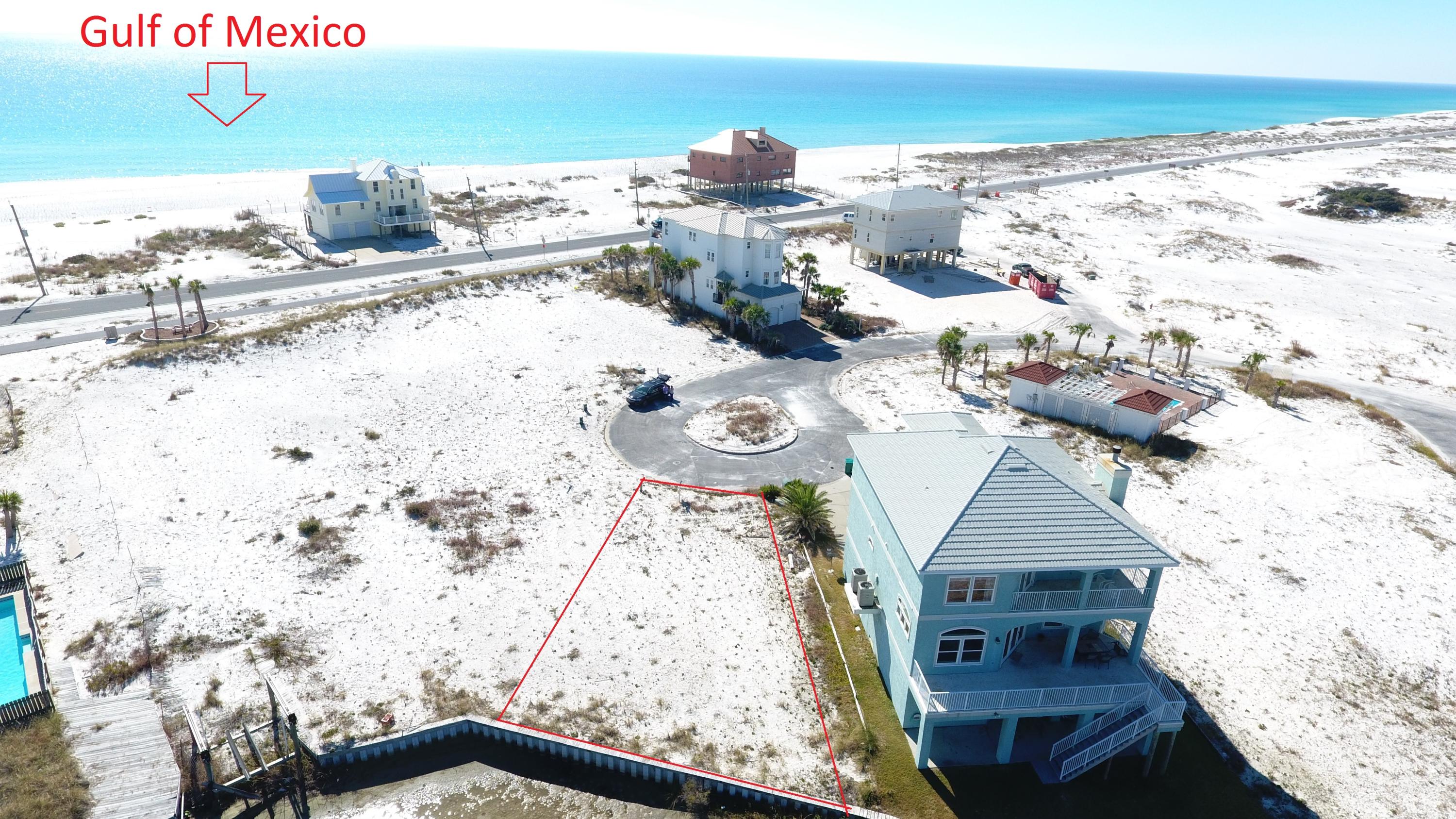CANAL FRONT LOT on Navarre Beach. Located in the gated community of Sailmaker cove on the west end of Navarre Beach with easy access to the Santa Rosa Sound. The community offers a community pool, and borders Gulf Islands National Seashore with miles of crowd free pristine beaches. Navarre Beach is one of the last places in Florida with the Old Florida feel. Miles of walking and biking paths, crowd free beaches, Navarre Beach fishing pier, Gulf Islands National Seashore to the west and the Navarre Beach county park to the east make this lot the best place to build your dream home. Call today for more details.