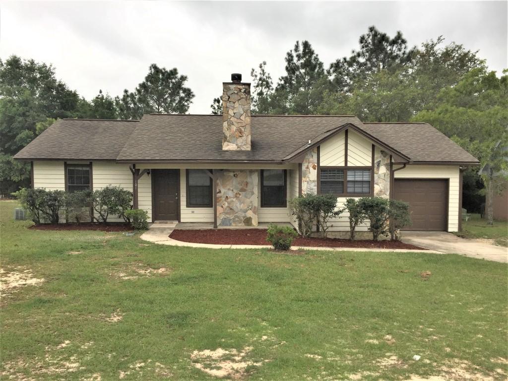 SOUTH SIDE OF CRESTVIEW ONLY MINUTES FROM MILITARY BASES!! Newly updated home with new Laminate Floors and New wall to wall carpeting in all bedrooms and Freshly painted inside. Home features 3 bedrooms and 2 full baths, an eat in kitchen, inside utility room, deep 1 car garage, a beautiful stone fireplace and 2 outside decks for entertaining your guests. The backyard is large and relatively flat which is hard to find on the south side of Crestview. Home is vacant and ready for immediate occupancy. Seller is a Licensed Florida Realtor