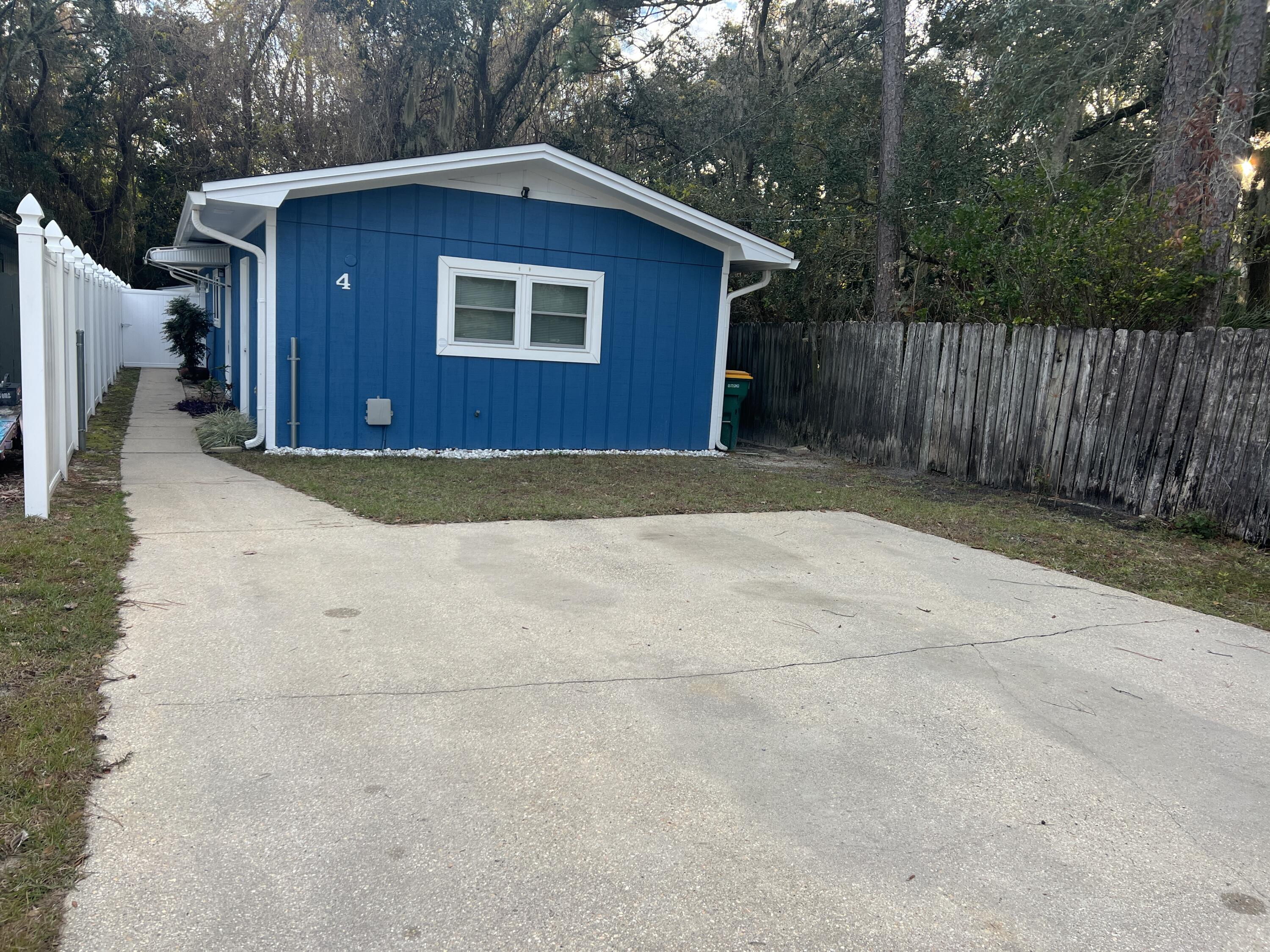 Discover this charming and versatile 2-Bedroom, 2-Bath frame-built home at the end of a Quiet Cul-De-Sac! Perfect for first-time homebuyers or savvy investors!  Conveniently located just 3 miles from Eglin AFB, and within easy reach of beaches, shopping, and dining, this property blends comfort, functionality, and potential income generation. Nestled in an established neighborhood, this home features private entrances for each of the two bedrooms, making it ideal for use as a single-family residence or as a dual-rental investment. Recent updates include a freshly painted exterior, New roof in 2023, New Water Heater in 2025 & New Vinyl Windows in 2011 for maximum energy efficiency!  The remodeled kitchen showcases leek quartz countertops, modern white shaker cabinets, and ample space to entertain or prepare meals with ease. Durable, hurricane-rated windows are installed throughout the home, except for the back bedroom, adding an extra layer of security and resilience. Additional highlights include a 12x12 shed perfect for storage or hobbies, and a washer and dryer that convey with the sale. The HVAC system, updated in 2016, provides efficient comfort, while a transferable termite bond offers added protection.  A brand new hot water heater was just installed!  Ceilings are smooth - no popcorn! Enjoy the low-maintenance yard, ideal for outdoor entertaining and relaxation without the hassle of extensive upkeep. Seller understands buyers may want carpet replaced with a different flooring and is willing to negotiate a flooring credit at the time of offer. This property's flexible design makes it an exceptional opportunity to create a cozy home or generate rental income.  Don't miss out on this gem!  