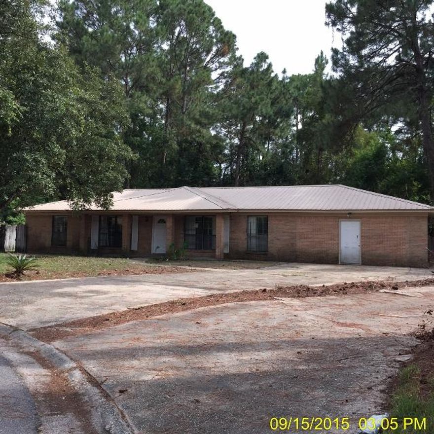 REO ~ Lots of Potential... This spacious 3 Bd / 2 Ba all brick home features an open floor plan with tile floors through out the living room, dining room & kitchen. Situated on a large lot offering a spacious backyard with deck & shed. Don't miss out on this great home. Property was built prior to 1978 and lead based paint potentially exists.