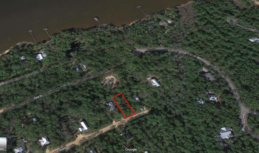 Nestled amidst the tranquility of nature, this vacant residential lot offers an unparalleled opportunity to build your dream home. Located in a prime area, the lot is enveloped by lush woods, offering privacy and serenity.Just a stone's throw away from Eden State Park and the vibrant 30A and Seaside areas, you'll have access to top-notch restaurants and the beautiful Grayton Beach and Blue Mountain Beach. The nearby Choctawhatchee Bay, shopping malls, and Panama City Beach add to the allure of this location.For boating enthusiasts, Point Washington Landing with its boat ramp is conveniently close (see pictures). The sandy bottom access to the bay is perfect for kayaking, paddleboarding, or skiffing. Plus, the property is in the X Flood Zone, meaning flood insurance isn't required.