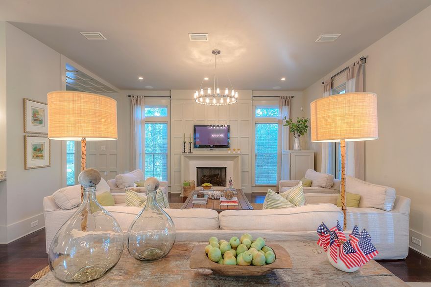 Welcoming front screened in porch with gas lanterns invites you in to this well cared for WaterColor cottage. Spacious living, dining and kitchen areas with 10' ceilings accommodates large family gatherings. Top of the line stainless steel appliances including a warming drawer, free standing ice maker and a 6 burner gas stovetop. Brazilian Cherry hardwood flooring throughout the first level leads you into the private master suite with its double door entry, large walk in closet and bath with free standing soaking tub. Private screened in porch off master allows lots of privacy. First floor laundry with sink and access to outside shower. Second floor has 2 additional bedrooms with private baths and large closets. Bunk room on 2nd level sleeps 4 and has a private bath with tub/shower