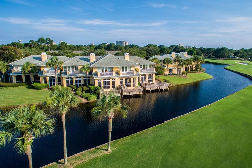 What a view! Situated on the 15th hole of the Links Golf Course, this three-bedroom, three-bathroom, western facing townhome offers fantastic bay, lake, and golf course views. An open floor plan creates a relaxed flow, while large windows provide an abundance of natural light throughout this residence. The first floor features a two-story foyer, guest bedroom and bath, a specious living and dinning area, an open kitchen, and a large screened poach to the back. The home's second floor master suite features spectacular views, private balcony, and a large master bath complete with double vanity, soaking tub, and separate shower. A second guest bedroom and private bathroom are also located on the second floor. Home comes with a 5'x8' outdoor storage unit. Sandestin