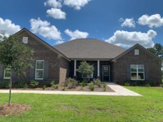 This is a Houston plan that has 4 bedrooms, 3 baths with a flex room. Nice covered porch, wood floors, tile, carpet. It is currently under construction but should be complete some time around the middle of August 2022.