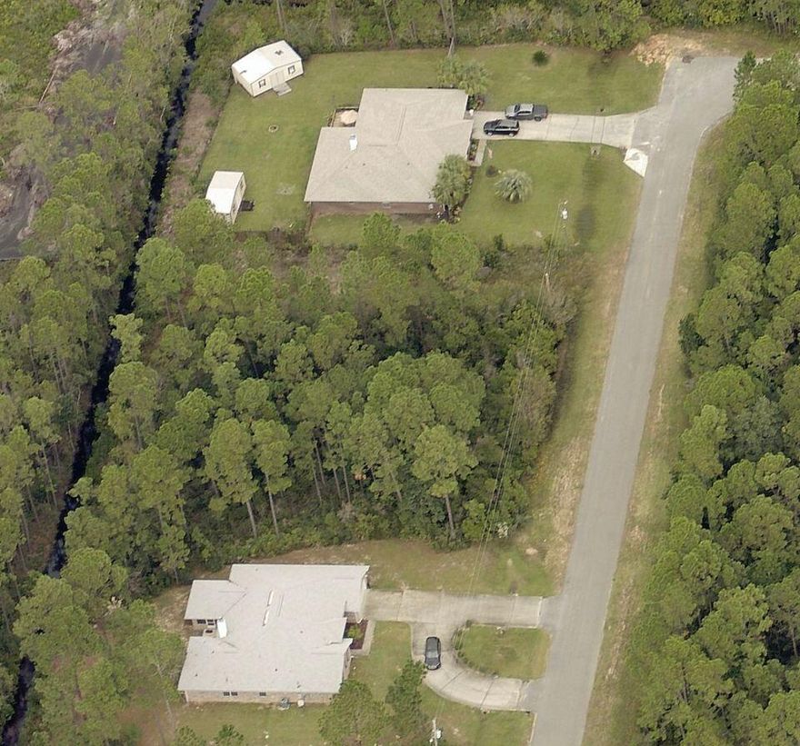 Massive lot in Holley By The Sea! Ownership includes membership to Holley by the Sea's multi-million dollar 45 acre recreational center with 8 clay tennis courts, 3 swimming pools, full gym, aerobics, summer camp, lighted basketball courts, sauna & steam room, playground game room, community house on Santa Rosa Sound with playground, dock, access to the East Bay boat launch and many community events. Only minutes to the pristine white sugar sand beaches and emerald water of the Gulf of Mexico.
Zoned: R1 Residential 
Size: .64 Acres 
Flood Zone: Yes
Possibly Wetlands buyer will need to verify