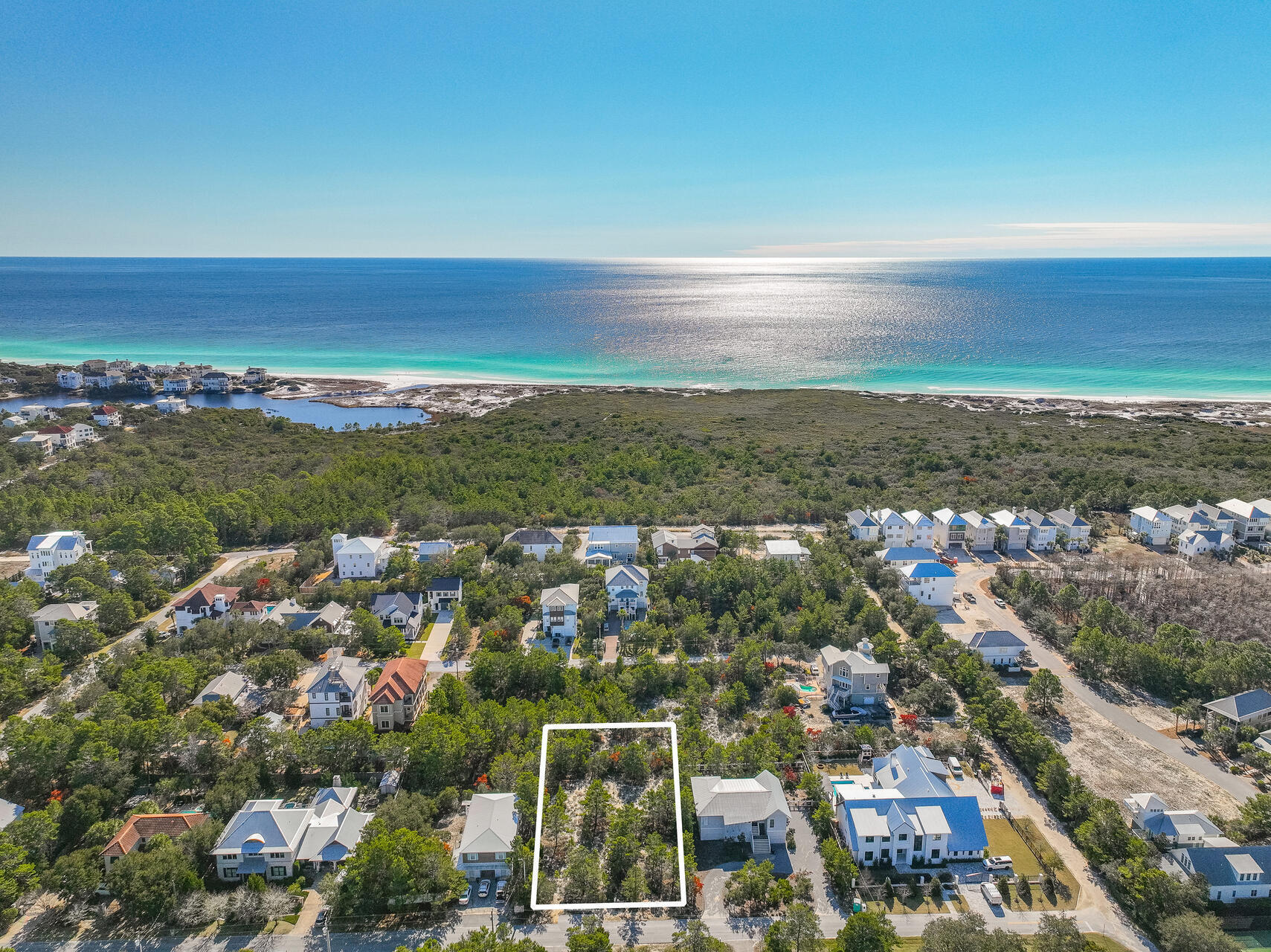 LARGE .32 ACRE LOT SOUTH OF 30A WITH NO HOA FEES. Live the 30A lifestyle you've always dreamed of drenched in sea, sun and serenity! Located on the tranquil West end of 30A, this spacious, South facing homesite (free from the confines of an HOA) offers a beautiful canvas to build your dream primary Home, 2nd Home or vacation rental. Its prime location South of 30A & near Topsail Hill Preserve State Park, provides easy access to 3.2 miles of secluded, white sandy beaches, 3 coastal dune lakes & coastal forests for hiking & camping. With local restaurants, Dune Allen Beach access, and Gulf Place & Grand Blvd's numerous shops, restaurants & special events close by, start living the coastal 30A lifestyle you've dreamed of.