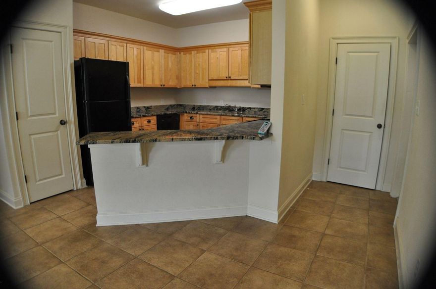 Unfurnished 2 Br 2 Ba Condo on the 2nd floor. Granite counter tops, open floor plan, small balcony, and a short walk to the beach!  No pets over 40lbs allowed in complex. Short term rentals allowed with a max occupancy of 5 guests and no pets. Topsail Village is not in a flood zone. New AC -- installed Nov 2020.