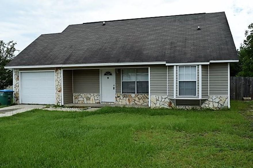 Looking for a great house south of I-10? Look no more! This charming 2 story home is just for you. Great floor plan with the master bedroom suite located on the 2nd floor. Large living room, kitchen, bath, laundry and 2 additional bedrooms make up the first floor. Level back yard with privacy fence for those 4 legged family members. Kitchen is fully loaded with all appliances. Conveniently located to schools, shopping, and bases with easy access to the interstate. Yard building located in the back yard for extra storage. Don't let this one pass you by, call for a viewing today! Buyers to verify any information they deem important. Seller is offer a Old Republic Home Warranty value of $425.