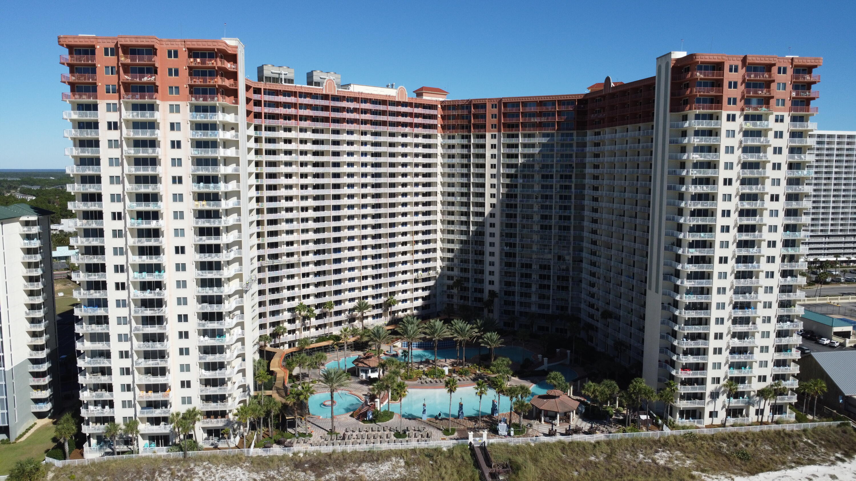 Location, Location, Location! If you're seeking the perfect blend of luxury, location, and investment potential for a vacation rental, this stunning condo is an opportunity you don't want to miss. Situated on the 2nd floor with direct Gulf views, this fully furnished, 907 sq. ft. modern condo features a spacious primary ensuite bedroom and a convenient bunk area with an adjoining full bath, providing an ideal layout for hosting family and friends.Located in Shores of Panama I, one of Panama City Beach's top-rated luxury resorts, this condo offers sweeping views of the Gulf and overlooks a resort-style lagoon pool, indoor heated pool, hot tub, and two tiki bars, all just steps away from the pristine white sand beaches and turquoise waters of the Gulf of Mexico. The open-concept living and dining area showcases modern coastal decor and includes luxury tile flooring, upgraded granite countertops, and a breakfast bar for casual dining. A private parking space on the 2nd-floor parking deck adds convenience.

Tired of viewing former Airbnb and short-term rental properties that show the years of wear and tear? You know the kindworn-out appliances, signs of damage, and neglect from careless renters. Not here. This condo has never been rented, has been smoke- and vape-free, and has only been used by the owner and their close family and friends.

Originally purchased for the incredible Shores of Panama pool when the owner's kids were in school, this gem is now available as the kids are grown and no longer visit. The owner's loss is your gain! Don't miss this opportunity to own a well-maintained, fully furnished condo that's ready for your personal use or to rent out. Located on the 2nd floor, you can easily take the stairs to avoid elevator waits. Plus, it comes with a guaranteed, deeded reserved parking spot.

Perfectly positioned in the heart of Panama City Beach, this condo is just a short walk from world-class dining, shopping, and entertainment. Onsite amenities like a coffee & donut shop, pizza parlor, and more ensure endless convenience. Don't miss out on this one-of-a-kind opportunitycontact us today to schedule your showing! All information and HOA Fees are deemed correct, and buyers should verify if deemed important. Shores of Panama resort has added a temporary assessment to all condos for two years in order to complete the state requirements regarding the exterior building project. Seller will pay up to $9600 the mentioned assessments during year of 2025. 