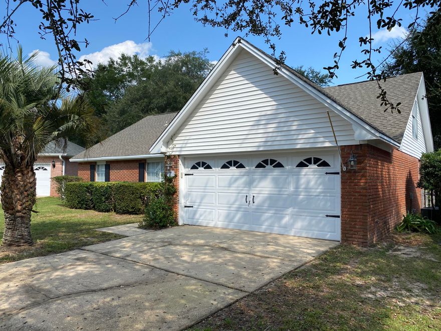 Back on the market with UPGRADES!!  This 4 bedroom, 3 bath home sits in a neighborhood in Bluewater Bay, and is a 1/4 mile from Bluewater Elementary.  The living and dining area is large and open with sliding glass doors leading to the screened in Florida room off the back of the home.  Two bedrooms are downstairs, including the master, and two bedrooms are upstairs.  The eat in kitchen has a cute breakfast nook.  Recent upgrades include new carpet, new counter tops in the kitchen and downstairs bathrooms, new kitchen sink, new garbage disposal, new water heater, new sprinkler pump.  Schedule your tour of this home today.