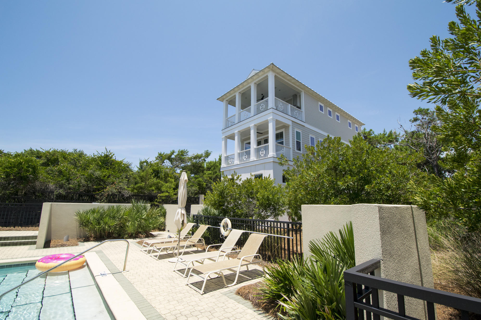 Mariner's Retreat, at Park Place at Inlet Beach, is a sophisticated version of the classic beach cottage. The second and third floor porches provide panoramic views of the gorgeous dunes, sugar-white sand beach and emerald green and azure waters of the Gulf. The spacious, flowing plan of the first floor easily transitions from intimate formal dining to casual entertaining. Our interior designer has carefully selected the color palette, fixtures and accents that make this home stylish, yet comfortable for the best in living at the beach. Mariner's Retreat was designed for the discerning home buyer and features high-end, custom amenities. The Better-Built difference is evident in the finish details in this home that include: unique light fixture, natural gas fireplace, oak wood floors