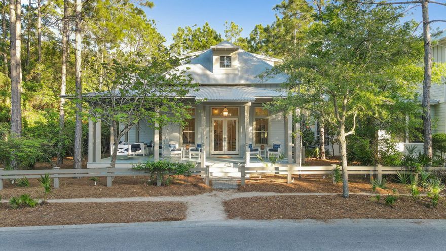 Welcome to your exquisite l 4 bedroom, 4.5 bath home located on an oversized lot nestled among the tall pines next to one of Watercolor's nature preserve in the Forest District. Entertain family & friends on the wide front porch or just relax on the swing and watch for fox and deer to appear early in the morning. Featuring a perfect floorplan with a large kitchen open to the living and dining room. Two of the four bedrooms are downstairs as well as a reading nook that opens on to the oversized back screened porch perfect for relaxing in the pines. Continue up the stairs to a fun loft and two bedrooms each with their own baths. Beautiful natural surroundings and nature filled grounds surround this well kept, turnkey, fully furnished home. Enjoy the 9 pools and private beach.