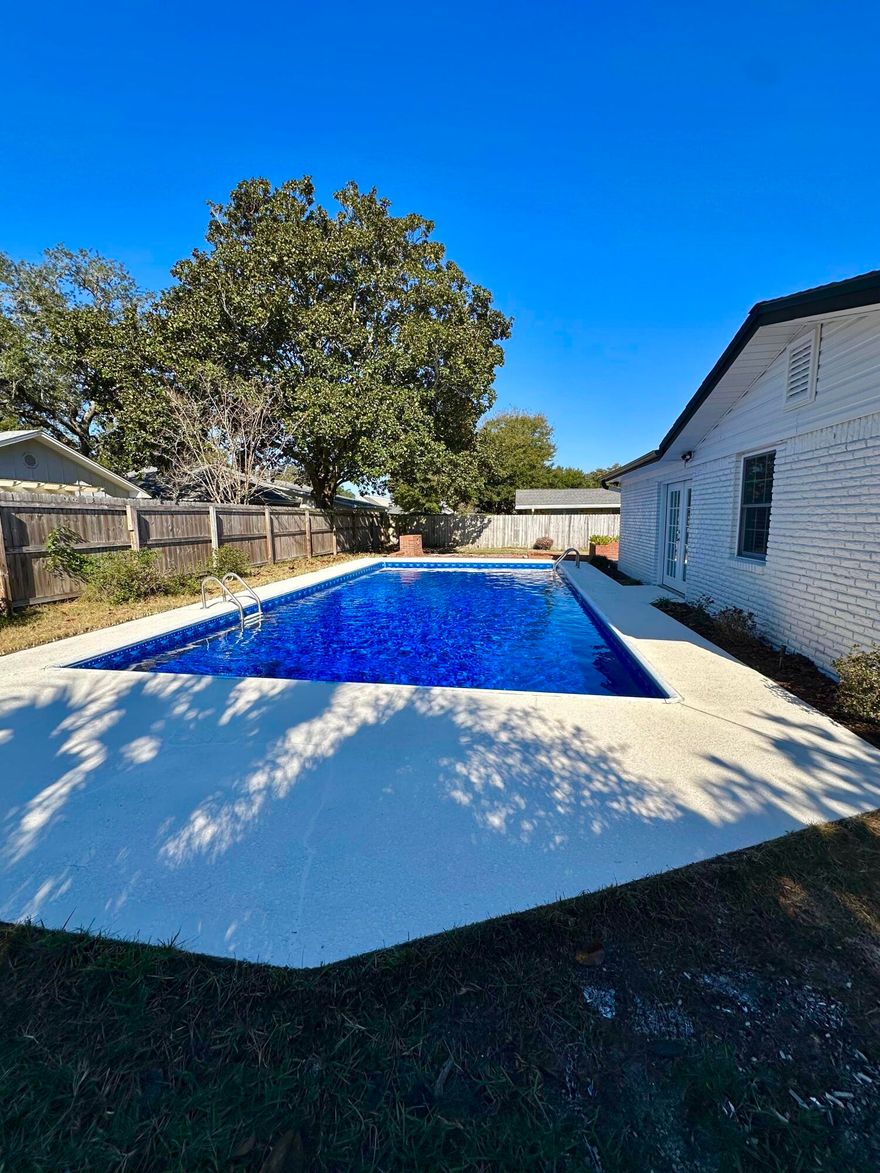 Professional Photos and new sod this week!  Pool Home Alert!  Bayou Woods Gem - Move-In Ready!3BR/2BA | 2000 sq. ft.  2025 Roof & Pool Liner  2021 AC + Updated Kitchen & Baths  Fresh paint, new fans/lights, complete rewire , Dedicated office with pool views New Sod coming this week.  Relax, entertain, and enjoy your sparkling pool in a prime location. This one won't last--schedule your showing today!