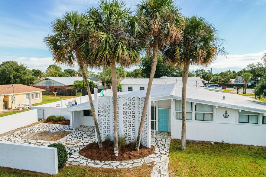 !! NO APRIL FOOLS !! PRICE IMPROVEMENT FROM 725K TO 699K!!  This immaculate TRUE Mid Century Modern home built in 1959, exudes all the charm of old Panama City Beach. This is the largest estate for sale in the area and located just blocks from the Gulf!  Please note, due to an additional lot included in the parcel, the price psf is not accurately depicted relational to living space.  The parcel includes 3 lots, 3/2 home, large pool and decking, pool house, and 36x24 storage building. The adjacent pool house comes complete with laundry room, bathroom, and small sitting area that could also double as a bunk nook.  Shopping, Dining, Beaches, FUN within steps of this property