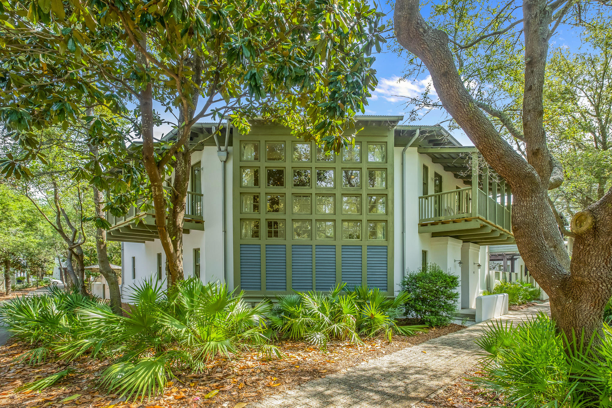 Don't miss the opportunity to own one of the most unique and tranquil properties in Rosemary Beach. The home has never been on the market; Built and owned by one family. Located in the heart of Rosemary, facing the E Long Green Park.The kitchen and main family room are located on the first floor, in addition to a powder bath, spacious laundry room, and queen guest room.This home offers 3 bedrooms, 3.5 baths, and two indoor living spaces. You will be spending most of your time on one of the four porches or outside in the courtyard. Floor to ceiling windows fill the first and second floor living areas with natural light and a beautiful view of Rosemary's well know Green and art installation. The property has ample amount of space to build a carriage house or pool.