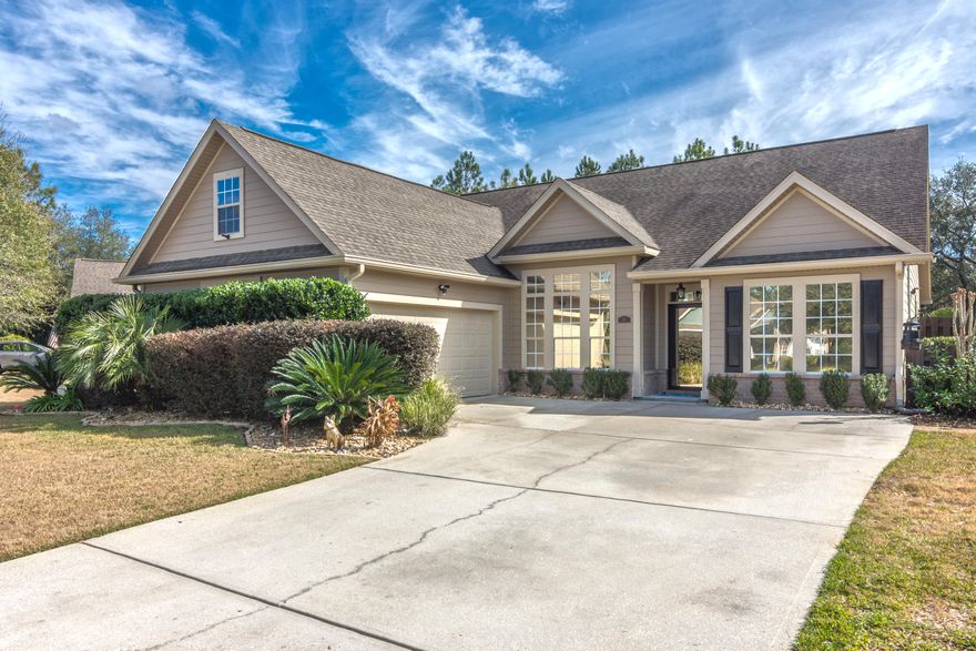 Live the best of what the Hammock Bay lifestyle has to offer! Come take a look as this meticulously kept home. This 3 Bedroom/2.5 Bathroom lakefront home, within the Symphony neighborhood offers everything you'll want and need including a private pool!! As you enter the home you'll immediately notice the beautiful elongated porcelain tile that flows throughout the entire home. The home has a office/bonus area to your immediate right and the formal dining area to the left. As you continue down the entry hallway, you will come into the Kitchen area. The kitchen features vaulted ceilings, pendulum lighting, gorgeous backsplash, a butcher block island, newer Samsung & Bosch appliances, and under & above cabinet lighting.