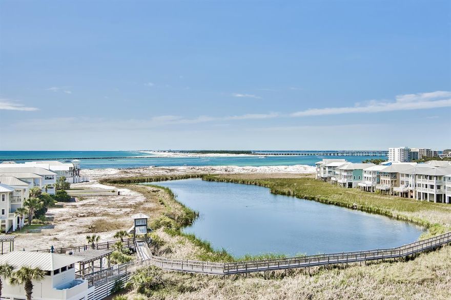 Amazing Views!  2022 Rental Bookings at $50,000   Gorgeous 6th floor 2/2 customized unit completely renovated with special one of kind added features and touches. The floor plan has been updated to provide an open, spacious feel and the flooring throughout is diagonally laid porcelain tile. The master bedroom offers a retreat feel. The bedside outlets include built in USB charging receptacles. There are ceiling fans in both bedrooms and the living area. The master bedroom features a spa bathroom with a custom walk-in shower with glass doors, granite countertop and plenty of storage space. The second bathroom is redesigned and features a granite countertop with double sinks and private shower area. There is a spacious kitchen featuring an extended bar length granite counter, custom