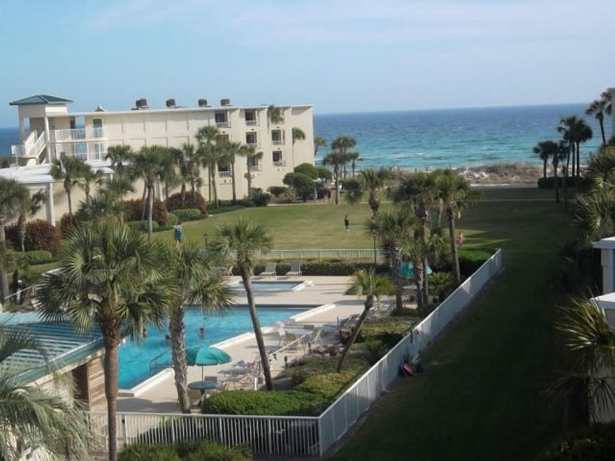 AWESOME VERY RARE 2 STORY CONDO ON THE BEACH!! Great Price! Open spacious floorplan, over 1400sf, Kitchen, LR, DR, Office nook, half bath on 1st flr. BRs, 2 full Baths & Laundry rm on 2nd flr. Beautifully decorated with 2 large Balconies. Property is gated w/ Security, Maintenance & an Office on site for your convenience. Small workout room. Furniture included. There is also a small storage room for this unit near water for Beach chairs etc. Great rental income & is rented most all of time except when owners come to town. Right in the middle of Destin close to Harbor, restaurants & entertainment.