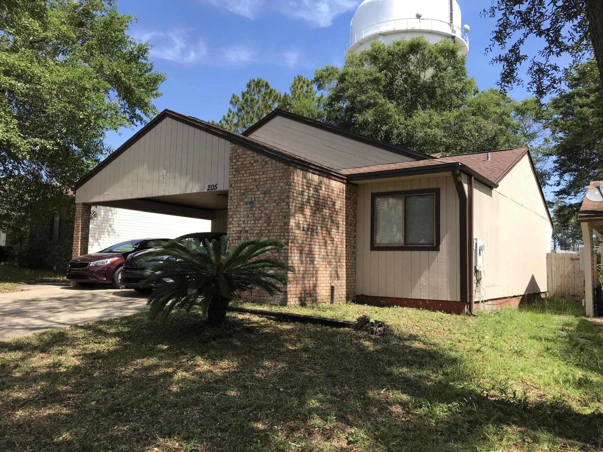 This 3 bedroom 2 bath home features a spacious living room, breakfast bar, dining area, fenced-in backyard with patio and a carport. Home has some recent upgrades with new windows and a new water heater. Newer roof, stove and dishwasher as well. Convenient location on a quiet street in the heart of Niceville, close to schools, bases and shopping. Come see it today!