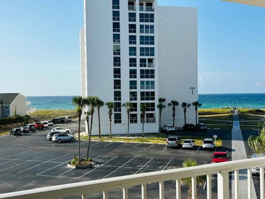 Great value in this spacious 1430 Sq Ft 2BR 2BA condo in Shoreline Towers. Gulf views from Kitchen, Living Room, Master Bedroom and Balcony. Quaint kitchen with corian counters. LVP flooring throughout, fresh paint, baseboards and Shiplap Dining area walls. This rental ready, easily accessible 4th floor unit is suitable as a primary residence, second home or short term rental.Shoreline 26 million dollar Restoration project completed.  Concrete restored, painted and waterproofed Buildings along with new elevators and state of the art floor to ceiling, high impact, double pane, tinted and insulated Windows and Sliding Glass Doors. Shoreline is centrally located on Gulf Shore Drive. Amenities include, heated pool, tennis, pickleball courts shuffleboard. Milestone Inspection Completed!