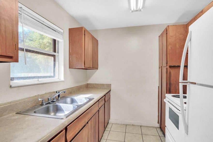 This 1,000 square foot, 3-bedroom, 1-bath brick home in Milton, Florida offers a solid opportunity for investors or buyers seeking a low-maintenance property with key system updates already in place. The durable brick exterior is complemented by a metal roof installed in 2015, providing long-term reliability and reduced insurance concerns. Inside, the functional floor plan maximizes space, while the HVAC system was replaced in 2023, offering improved efficiency and peace of mind.The property sits on a generous lot with a spacious, fully fenced backyard--ideal for tenants, pets, or future enhancements.  This home is well-positioned for consistent rental demand. With strong fundamentals and recent capital improvements,